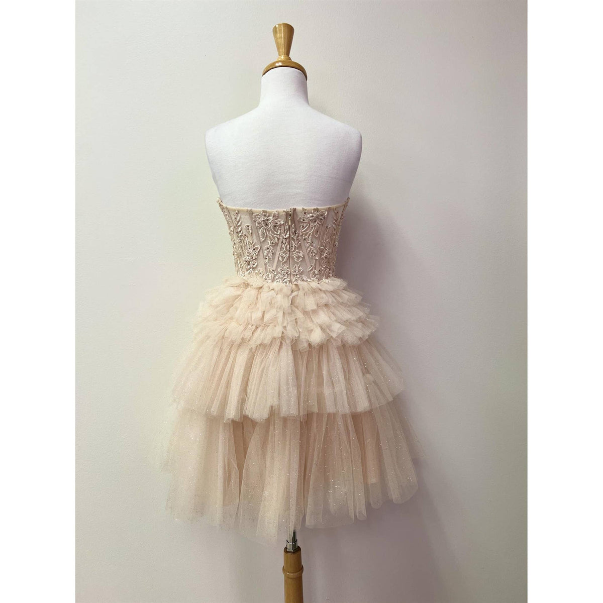 STRAPLESS COCKTAIL GOWN WITH LEAF LACE CORSET BODICE AND RUF