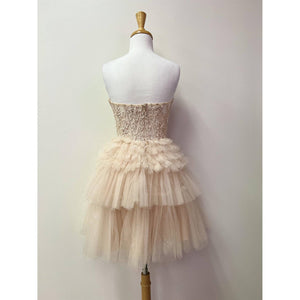 STRAPLESS COCKTAIL GOWN WITH LEAF LACE CORSET BODICE AND RUF