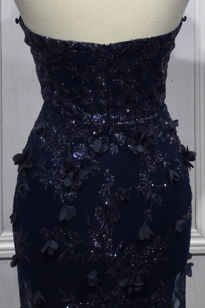 STRAPLESS FITTED GOWN WITH LACE CAPE
